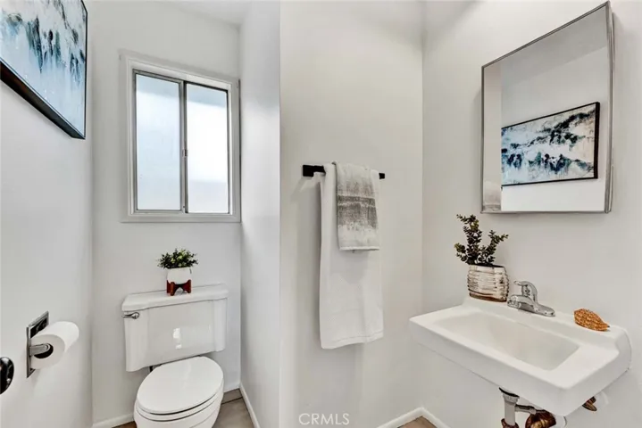 Half Bath Located off Kitchen and the Door to the Garage. Great for Easy Clean up when coming in from the Garage