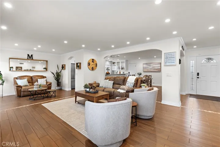 Adjacent is a dining area and family room, providing ample space for entertaining.