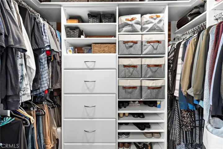 Huge walk in closet with organizer