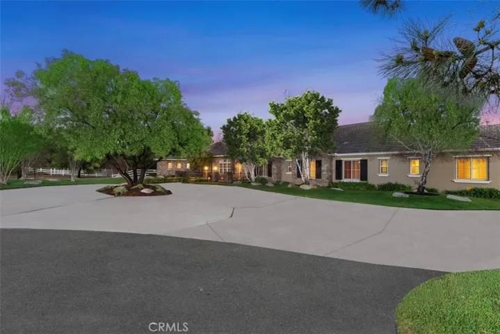 Large circle driveway plus 5 car garage.