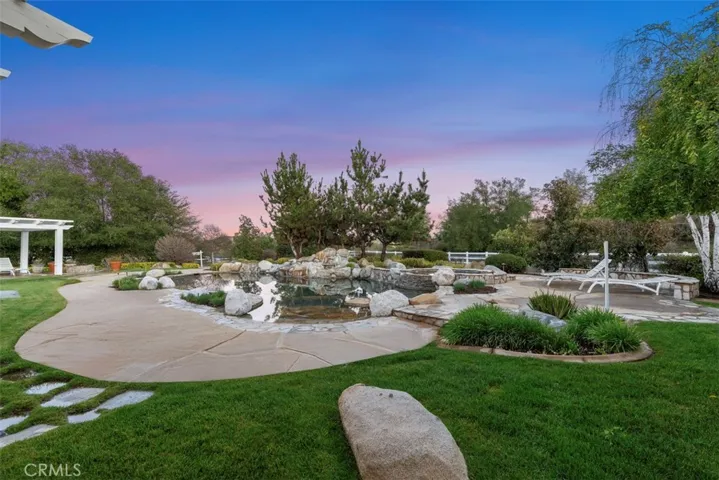 Professionally landscaped backyard.