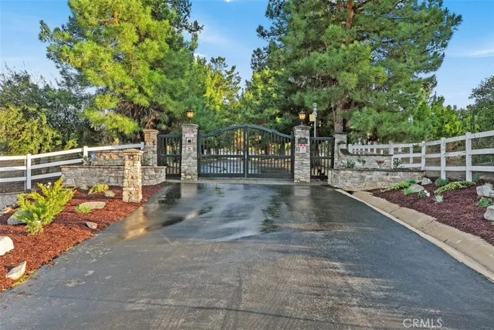 Private gate estate with security cameras.
