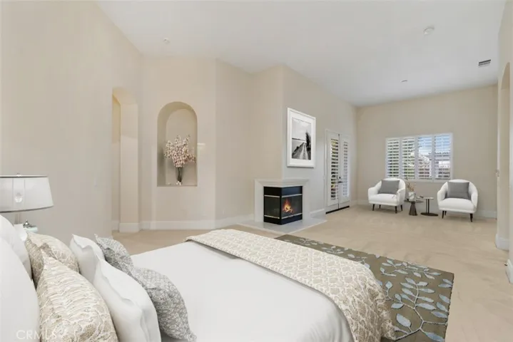 Master suite with fireplace.