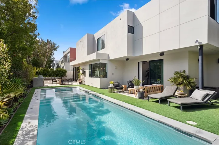 Experience elevated living in this extraordinary contemporary Top of the World pool home, where breathtaking mountain and city light views meet sophisticated design.