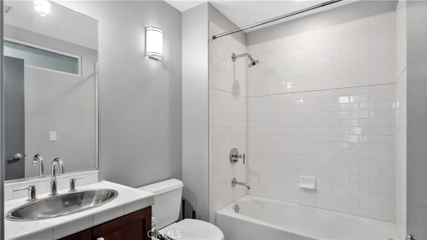 Off kitchen is full bathroom.