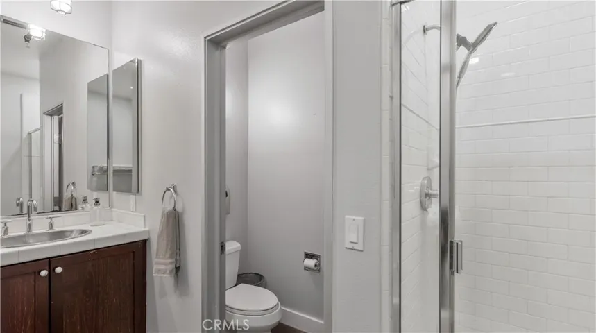 Primary bathroom separate shower.