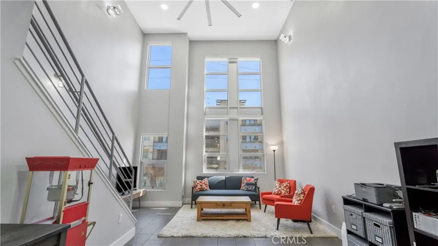 Second level with two story ceiling in the living room.