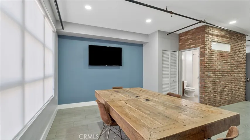 Off the dining area is full bathroom.