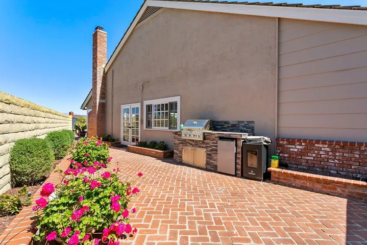 Built in BBQ and outdoor fridge off kitchen
