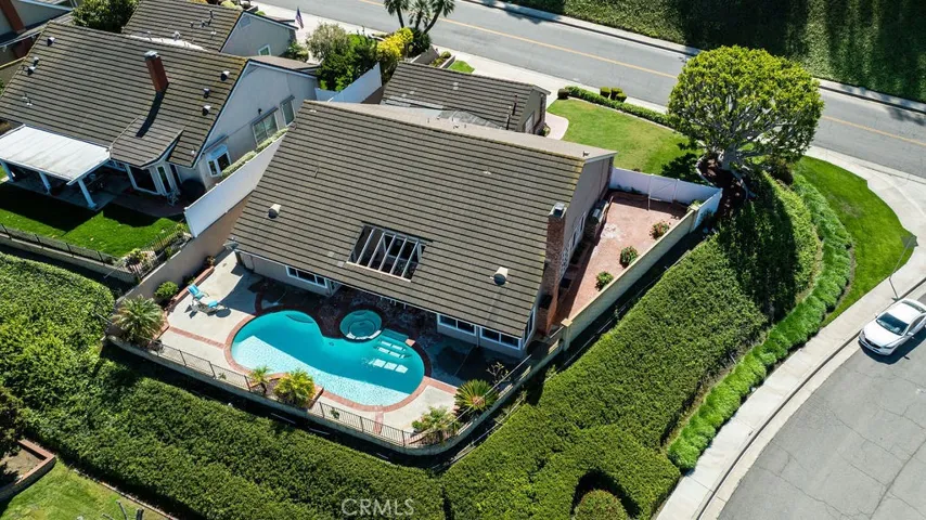 Adjacent over 15,000 square foot upwards slope deeded to 4401 E Ridge Gate and maintained by HOA