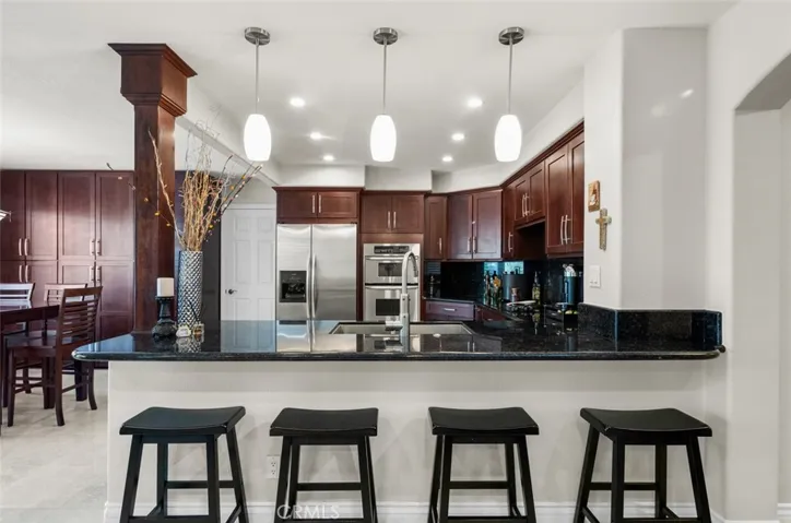 Giant pantry along the left wall is all customized and 24 inches deep!