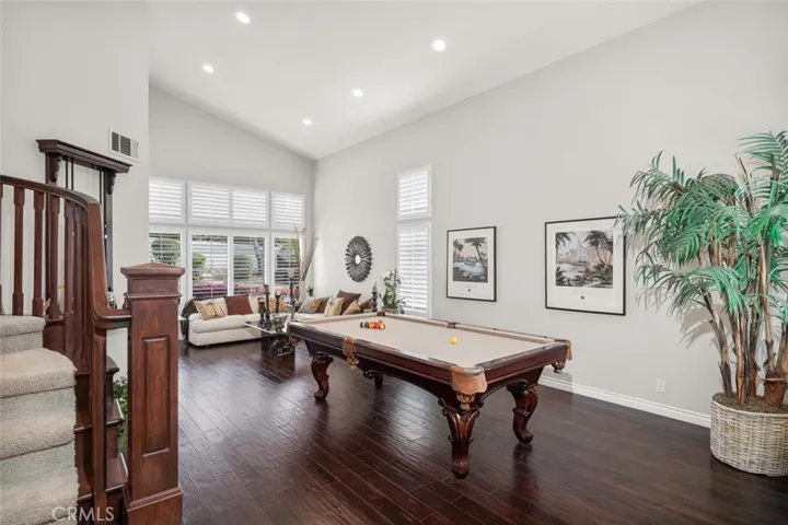 Beautiful floor plan with many custom features including hardwood flooring, custom added recessed lights.