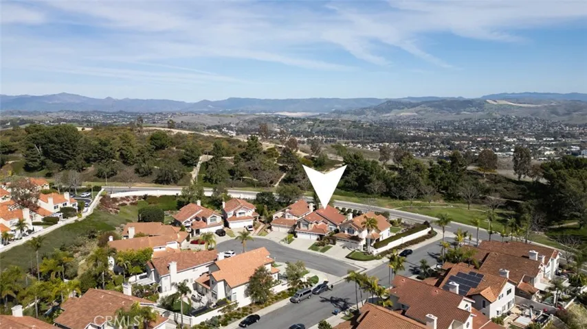 Laguna Heights area of Laguna Niguel is meticulously cared for. Quiet neighborhood street behind and then the Colinas Trail above.