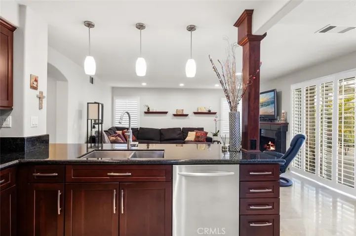 Enjoy visiting with family or friends in the family room while preparing delicious meals in the kitchen.