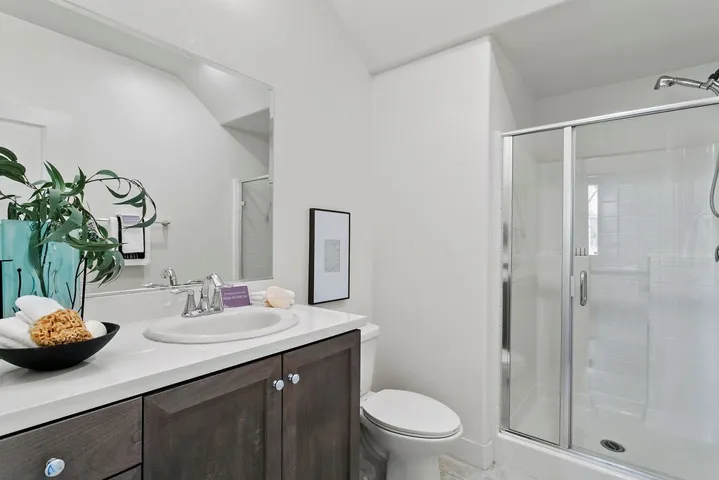 First level oversize walk in shower and vanity