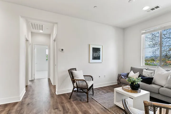 Loft at top of stairs separates primary from 2 upper level bedrooms