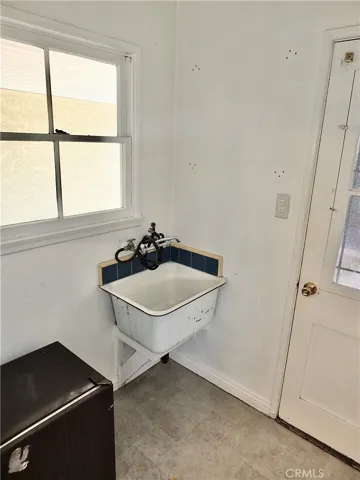Possible laundry area off kitchen