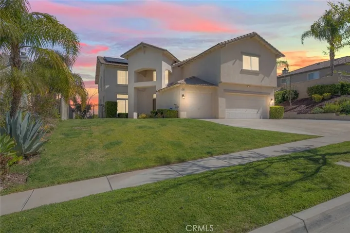 Beautiful curb appeal with a well maintained lawn