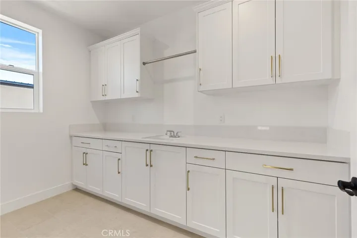 Laundry Room: Beryl Modern Farmhouse - Hidden Oaks Collection - Photo of artist rendering.  Not actual home for sale.  Home is still under construction.