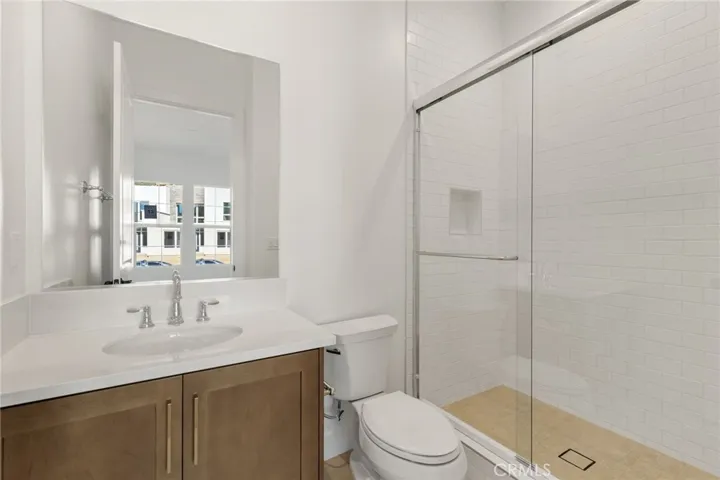 Secondary Bathroom Suite: Beryl Modern Farmhouse - Hidden Oaks Collection - Photo of artist rendering.  Not actual home for sale.  Home is still under construction.
