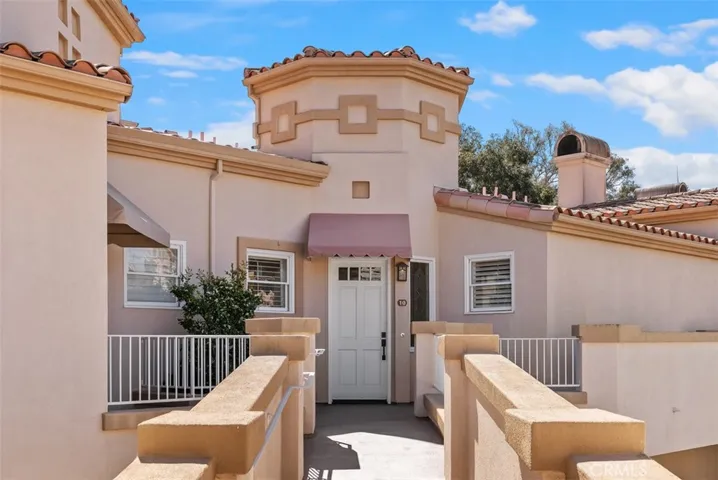 Walk up the ramp to the front door.