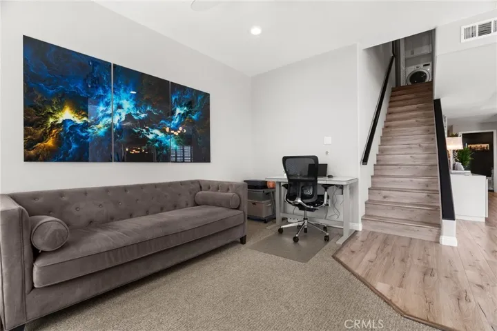 Den/Office leading to second floor.