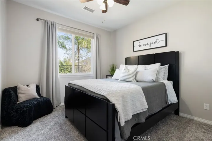 Main floor bedroom with attached bath