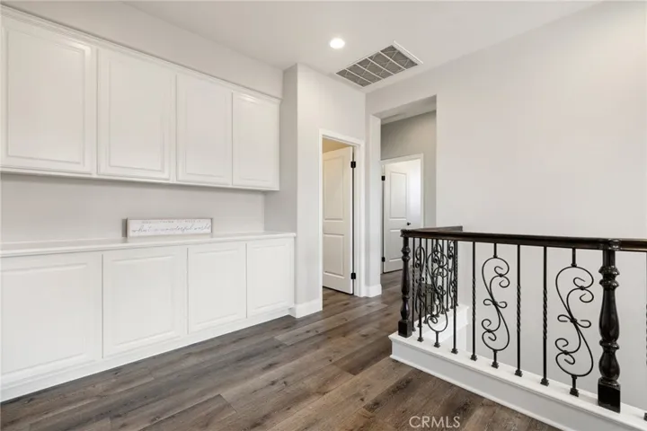 Access to secondary bedrooms, secondary bathroom, and laundry room
