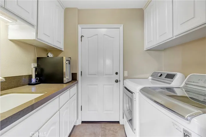 Laundry room with utility sink