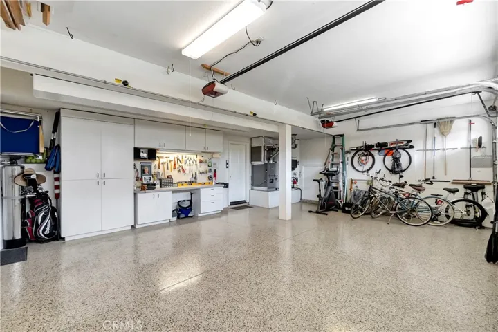 Direct access to the 3-car garage with additional 3 side-by-side parking spaces on the driveway apron