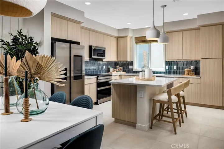 kitchen with island - photos are of builder model home