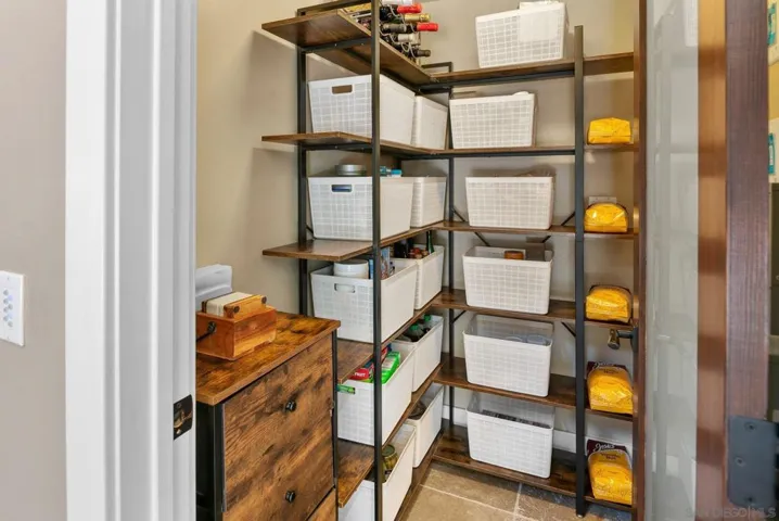 This pantry (or storage room) has an instrument panel behind the door (can't see it in this photo) to control much of the lower floor and exterior lighting.