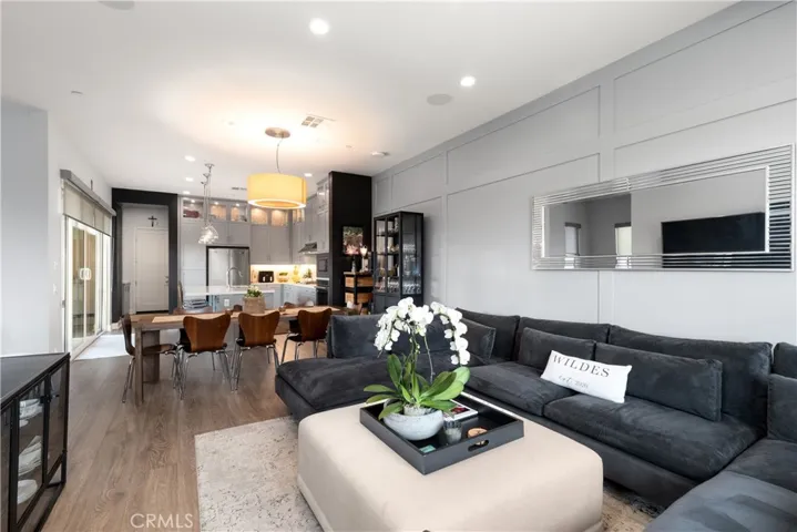 Open concept living room looking into dining room.