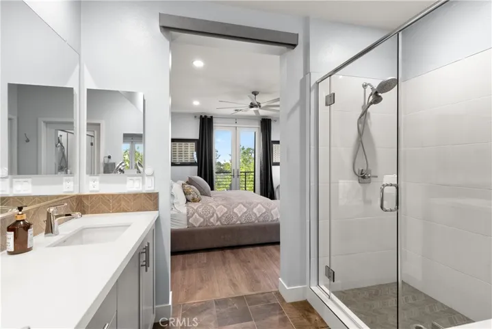 Primary ensuite bathroom with large walk-in shower