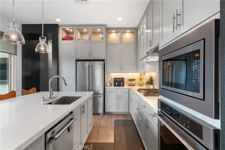 Spacious kitchen features modern appliances and ample countertop space.