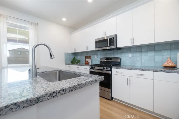 Stainless steel basin with arc faucet