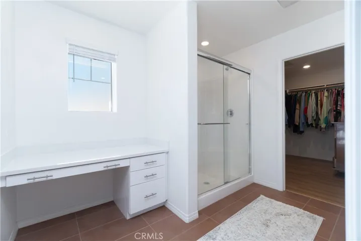 Glam bar with ample storage; Large walk-in closet