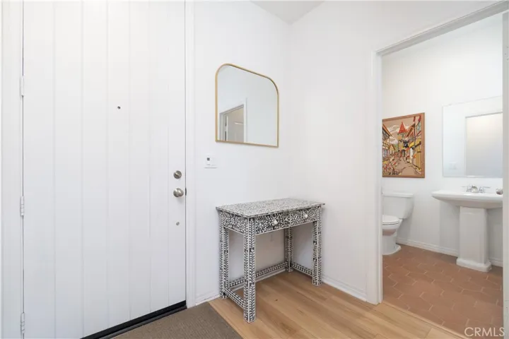 Guest washroom with pedestal sink