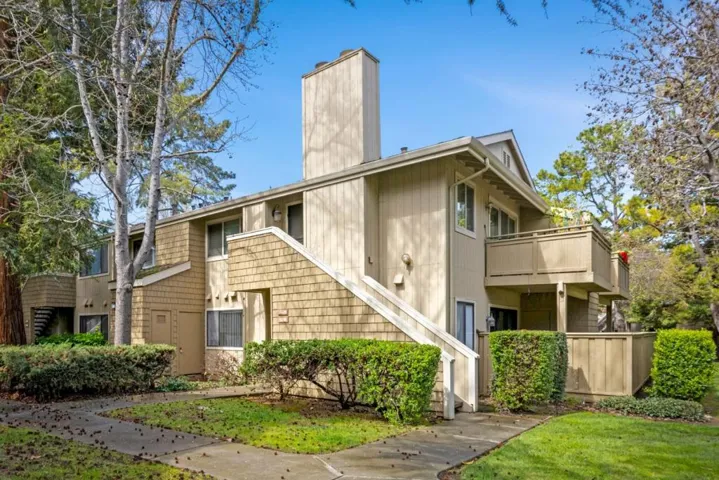 5318 Lower Level Unit with private patio [front door under to left of stairwell, patio to right]