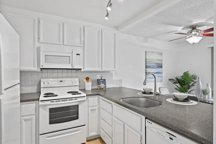 Kitchen was freshly painted for market, newly installed LVP, new sink faucet