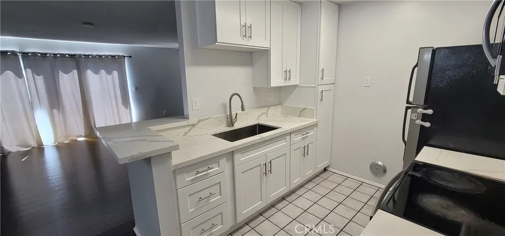 All new kitchen cabinets, quartz counter top