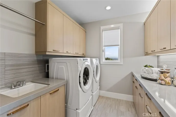 Laundry Room: Sunstone - Hidden Oaks Collection -                                             
Photo of Model home.  Not actual home for sale.  Home is still under construction.