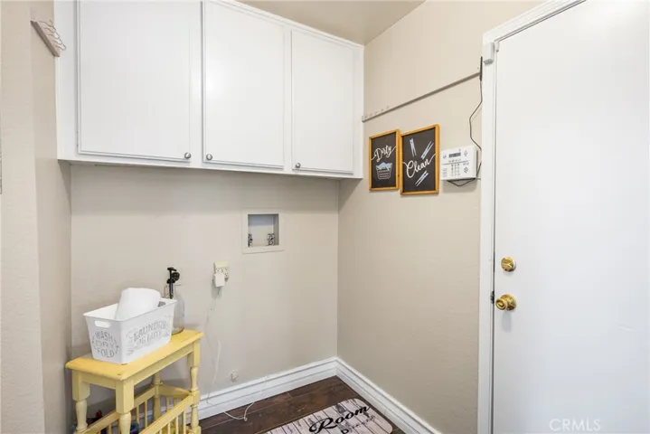 Separate downstairs laundry room.