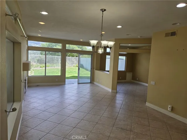 LIVING/DINING W/ WINDOWS TO ENJOY GREAT VIEW!