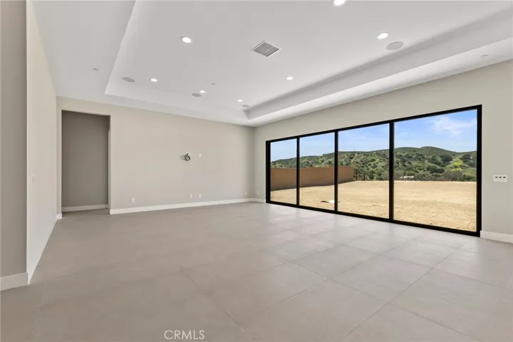Living Room: Oakdale - Ridge Collection at Bella Vista- Photo of an Oakdale type.  Not actual home for sale.  Home is still under construction.