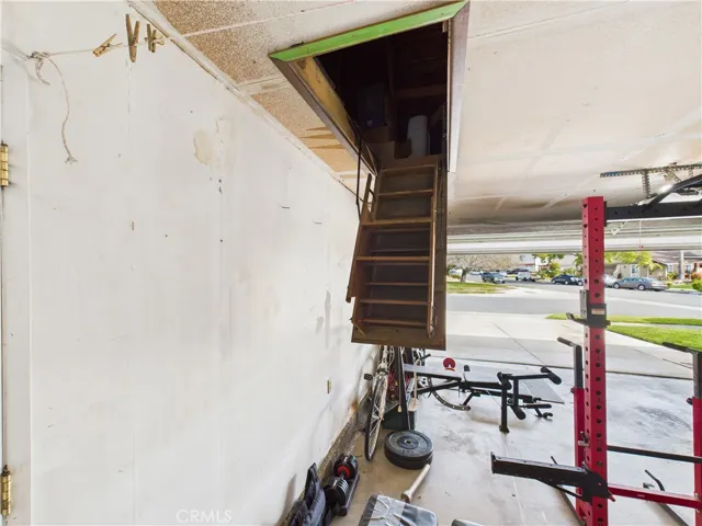 Pull down stairs with lots of storage above the garage