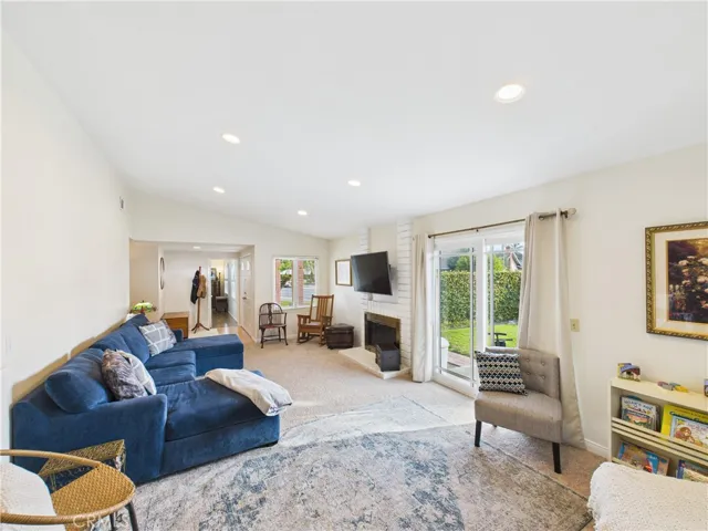 Large, bright living room with vaulted ceilings