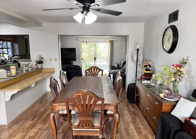 As you step through the main door of the house, turning right leads you to the formal dining area, which like the open-concept kitchen, opens up to the family room.