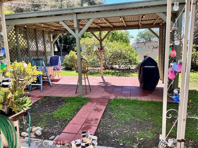 View of backyard from the covered patio