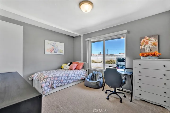 One of Two additional spacious bedrooms
